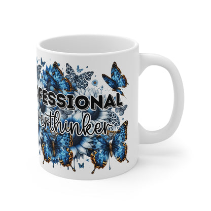 Professional Overthinker Ceramic Coffee Mug — Blue Floral Tattooed Woman Design 11oz